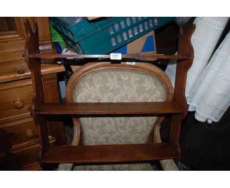 An Edwardian Mahogany three tier Wall Shelf with peg joints