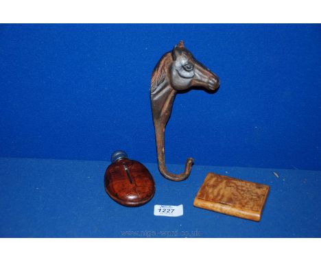 A Horse head metal coat hook, wooden Snuff box and a leather bound Hip Flask.