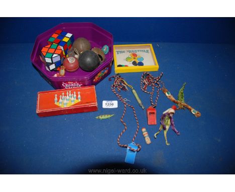 A quantity of vintage Toys including a Yoyo, rubber balls, whistles, etc.
