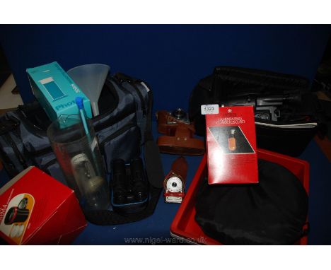 A quantity of old Cameras and film developing equipment including  a JVC Compact VHS camera, etc.