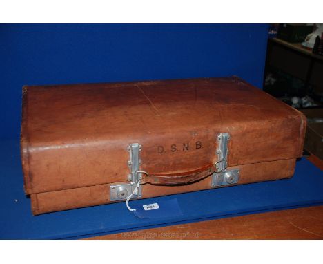 A large vintage leather Revelation Suitcase.