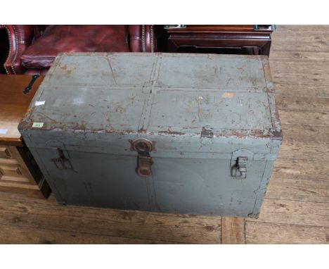 A vintage tin clad painted steamer trunk