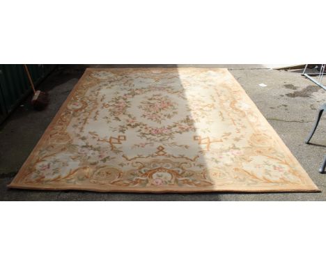 A large vintage cream, beige, green and pink floral rug, approx. 250cm x 310cm