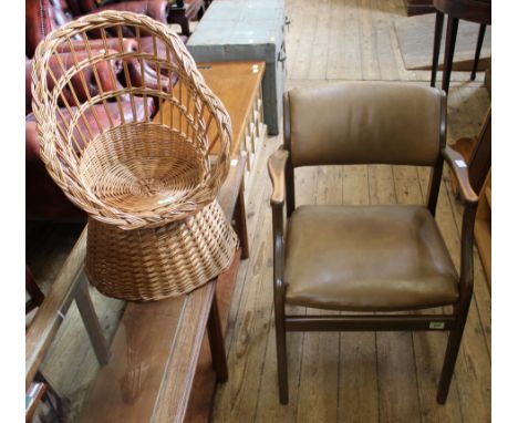 A vintage child's canework armchair and a vintage Parker Knoll armchair