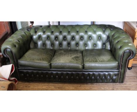 A green leather three seater chesterfield sofa, approx. width 188cm x depth 88cm x height 69cm