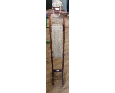 A vintage adjustable wool winder