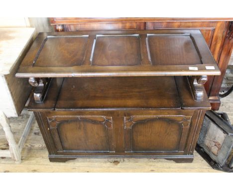 A mid 20th Century Jacobean style oak monks bench