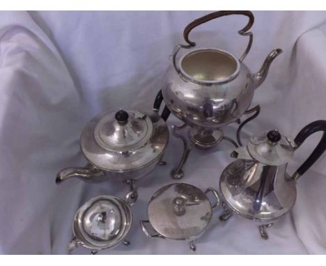 A Four Piece Silver Plated Tea Set comprising: Teapot, Hot Water Jug, Cream Jug and Sugar Basin, all raised on short legs wit