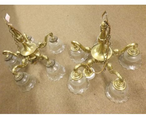 A pair of 20th Century Brass Five Branch Ceiling Light Fittings, with scrolled detail and clear frilled glass shades, approx 
