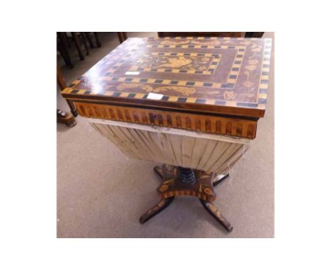 A 19th Century Marquetry Inlaid Composite Work Table, the lifting lid profusely inlaid with panels of foliage and chequerboar