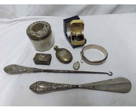 Mixed lot comprising hallmarked Silver bangle, Silver matchbox cover with cherub decoration, miniature Silver flask of oval f