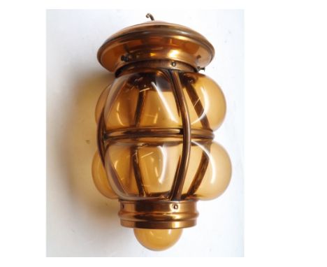Copper framed and amber glass hanging ceiling light shade, approx 12" long 