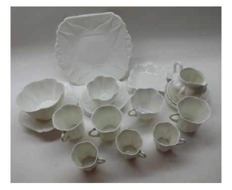 Quantity of white Shelley tea wares registered number 272101 comprising double handled Sandwich Dish, Cream Jug, Sugar Basins