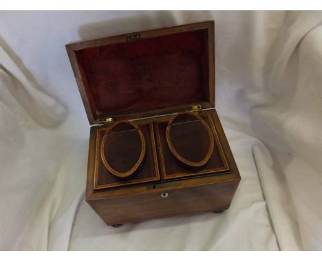 Small Georgian Mahogany Tea Caddy of rectangular form, the interior with two containers with hinged lids, the body raised on 