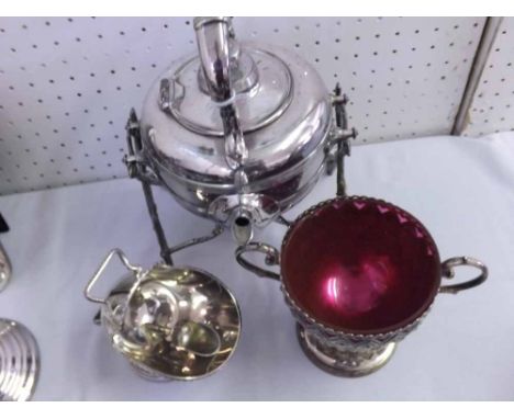 A Mixed Lot comprising: a Silver Plated Victorian Spirit Kettle on twig-shaped stand; a Silver Plated Sugar Basin with cranbe