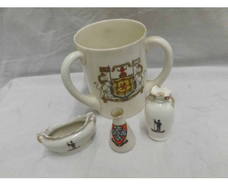A W H Goss Three-Handled Tyg decorated with the Arms of Dundee and three further small items of Crested Ware (4) 
