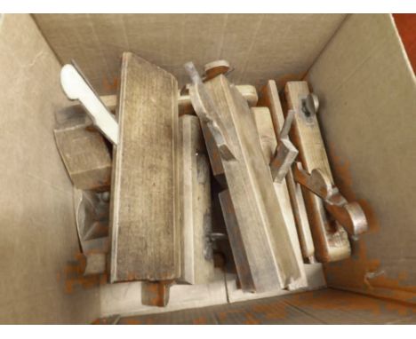 A collection of various vintage moulding planes etc  