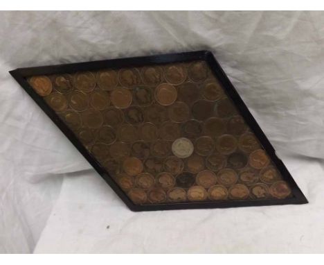 Unusual vintage tea pot stand inset with a collection of English pennies etc, 18.5"  long 