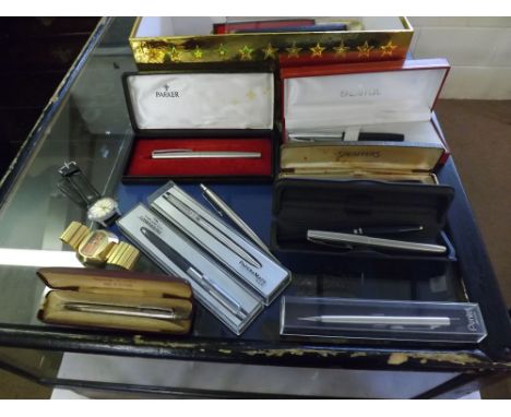 Box containing a collection of various late 20th Century Fountain Pens and Biros etc including Parker, Pentel, etc, a gent s 