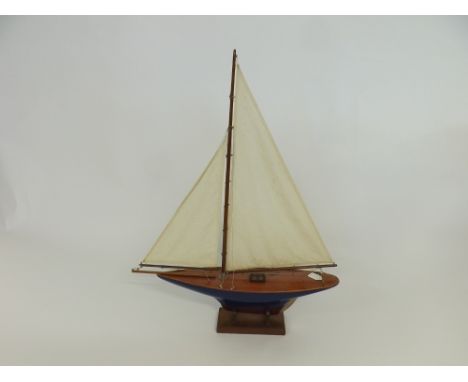 Vintage pond yacht with blue hull on stand, 28" long 
