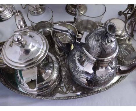 A Mixed Lot of Silver Plated Wares comprising: Teapot, Hot Water Jug, Coffee Cups with glass liners, Oval Silver Plated Tray 