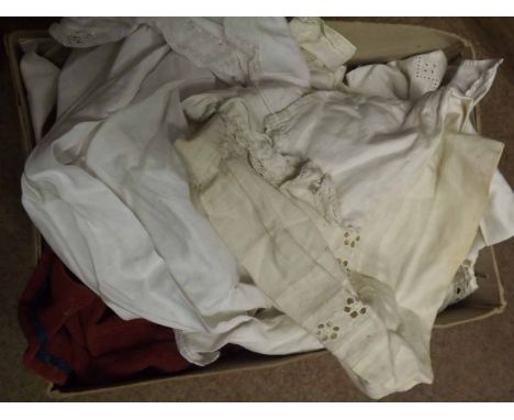 A box containing a large quantity of assorted vintage and hand-made doll s clothing  