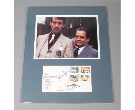 Only Fools and Horses; a mounted autograph display of David Jason (Del Boy) and John Challis (Boycie), both signed to a first