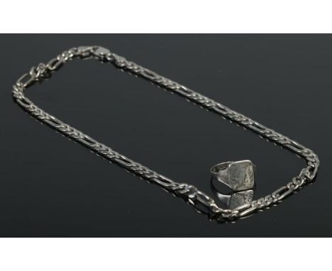 A figaro link silver necklace chain, together with a Gents signet ring, size TÂ½. Total weight: 24.37g.  