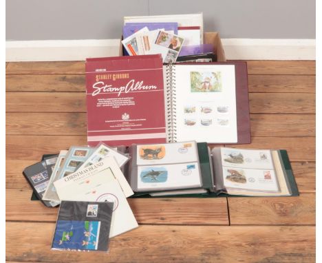 A box of stamps and first day covers, together with a Stanley Gibbons stamp album. To include Flora and Fauna albums, Jersey 