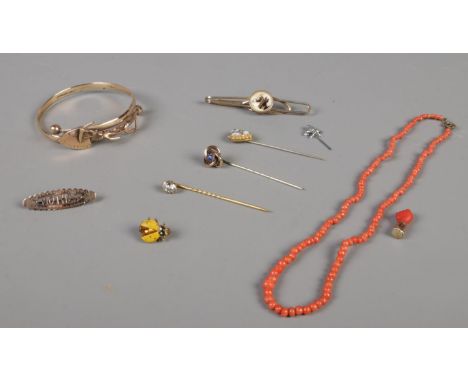 A quantity of vintage Jewellery &amp; coral. To include 18ct gold plated bangle, brooches &amp; hat pins.  