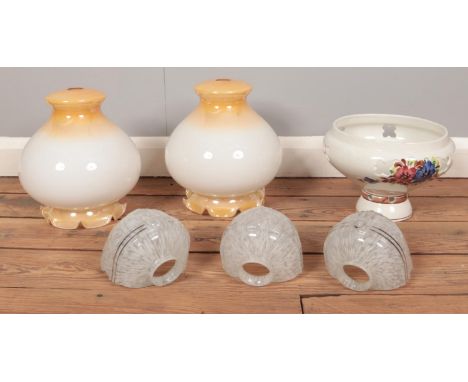 A box of assorted vintage glass light shades.  