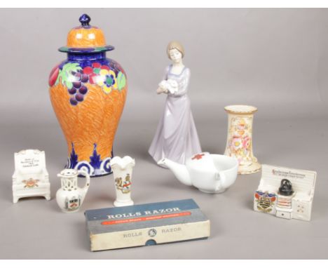 A small quantity of miscellaneous. To include Lasol Ware lidded vase, Nao figurine, crested ware etc  