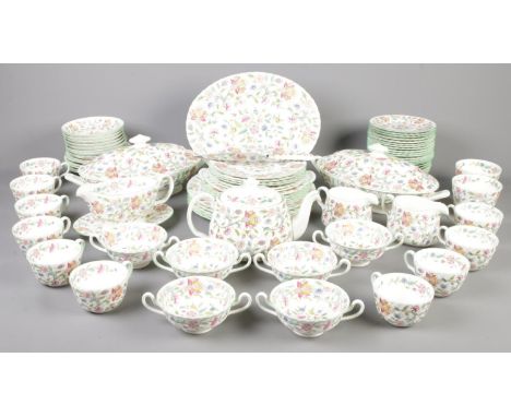 A box of Minton Haddon Hall dinnerwares. Including cup &amp; saucers, teapot, sugar bowls, etc.  