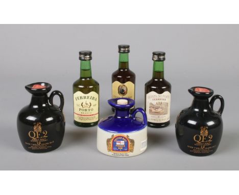 A small collection of alcohol miniatures to include Pusser's Rum, QE2 Scotch Whisky and Dona Antonia Porto. (6)  