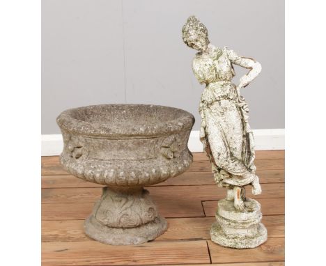 A concrete garden planter, along with a garden ornament in the form of a maiden.  