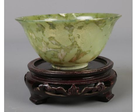 A Chinese spinach Jade small bowl. (10cm diameter 6cm height) with stand.  