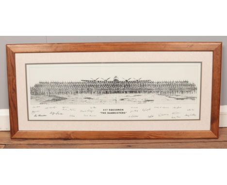 A framed photograph print with signatures of '617 Squadron The Dambusters. (23cm x 68cm)  