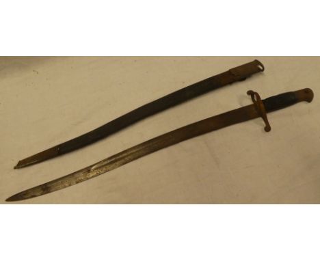 A 19th Century Martini Henry Volunteer bayonet with single edged blade and leather grips in steel mounted leather scabbard (a