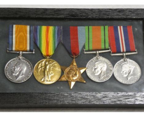 A group of five medals awarded to Lieut. R. N. E. Watt:- First War pair of medals with 1939/45 star, Defence medal and War me