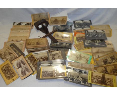 A large selection of various stereoscopic photographic cards including topographical scenes, view in America, military and ot
