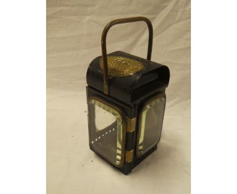 A small old brass mounted metal fire engine hand lamp by Merryweather &amp; Sons, Fire Engine Makers of Longacre, London