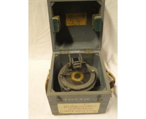 An Air Ministry Azmith circle liquid compass in fitted wooden case 