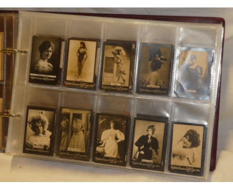 An album containing a selection of over 400 Ogden's guinea-gold cigarette cards - actresses, portraits and famous figures