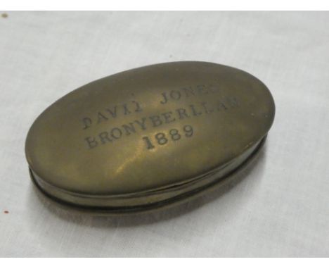An old brass Welsh miner's oval snuff box engraved "Davii Jones Bronyberllan 1889"