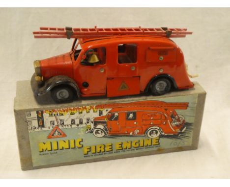 A Tri-ang Minic clockwork fire engine in original box