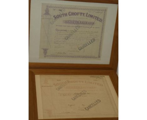 Two South Crofty Limited Mining share certificates dated 1934 and 1937, framed and glazed