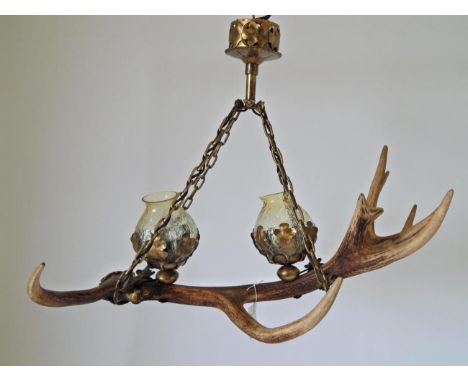 An Austro-German Red Deer Antler Light Fitting, constructed from a single Red Deer antler, fitted with two light fittings eac