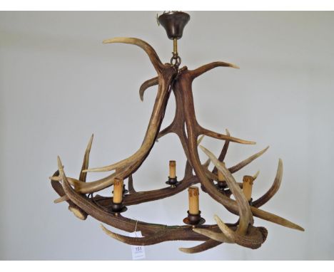 An Austro-German Red Deer Antler Chandelier, constructed from six Red Deer antlers, fitted with six candle style light holder