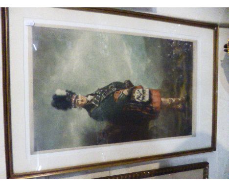 A Framed Coloured Print of a Scottish Soldier