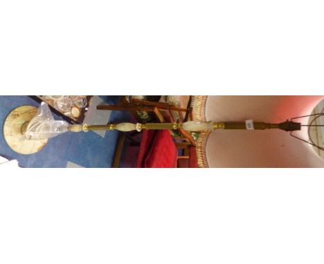 A Brass and Onyx Standard Lamp